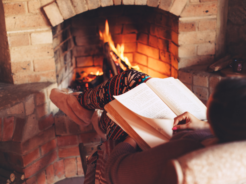 Family relaxing at home during winter.