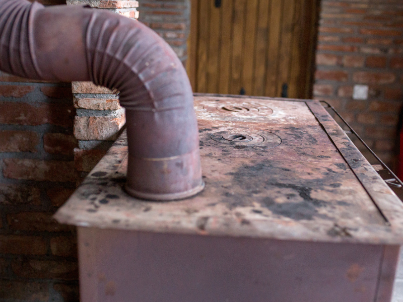 A close-up of an aging furnace nearing the end of its lifespan, a common sign it's time for replacement. Know When To Replace Your Furnace.