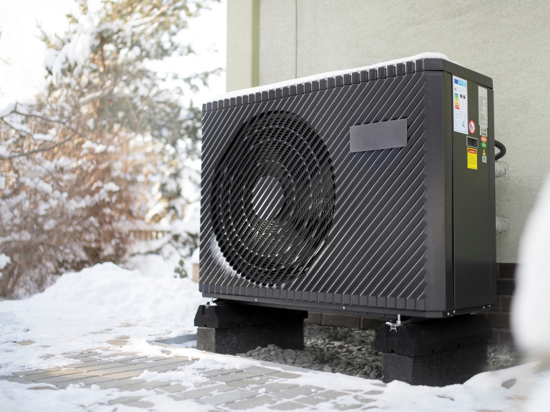 Heat pump system on an Edmonton home exterior.