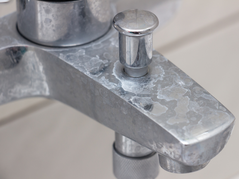 Faucet in an Edmonton home showing limescale buildup due to hard water.