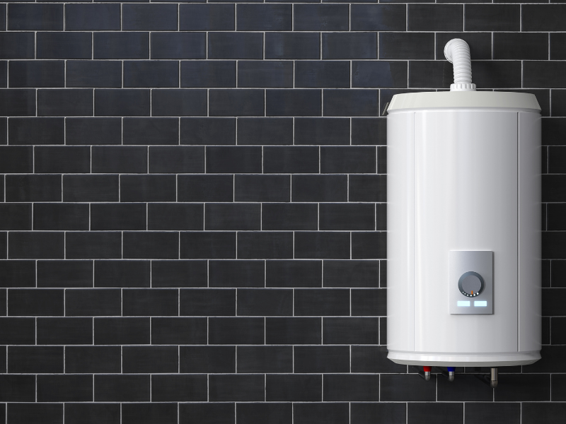Green plumbing upgrades: a modern tankless water heater installed in a home, providing instant hot water.